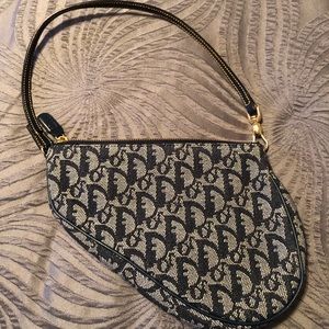 Authentic CHRISTIAN DIOR monogram mini saddle bag